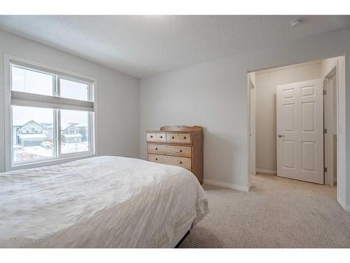 401 Clydesdale Way, Cochrane, AB - Indoor Photo Showing Bedroom