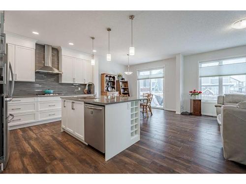 401 Clydesdale Way, Cochrane, AB - Indoor Photo Showing Kitchen With Upgraded Kitchen