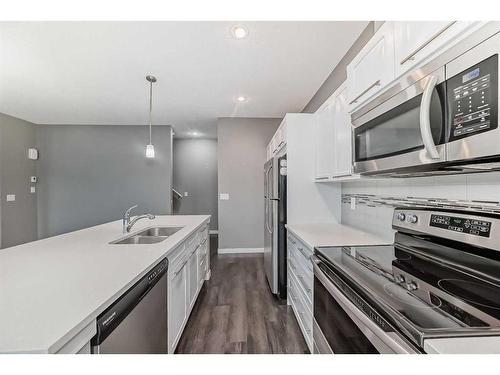 1203-881 Sage Valley Boulevard Nw, Calgary, AB - Indoor Photo Showing Kitchen With Stainless Steel Kitchen With Double Sink With Upgraded Kitchen