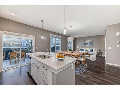 1203-881 Sage Valley Boulevard Nw, Calgary, AB - Indoor Photo Showing Kitchen With Double Sink