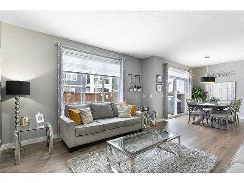 17 Riviera Bay, Cochrane, AB - Indoor Photo Showing Living Room