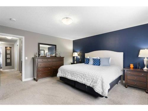 17 Riviera Bay, Cochrane, AB - Indoor Photo Showing Bedroom