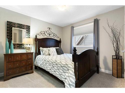 17 Riviera Bay, Cochrane, AB - Indoor Photo Showing Bedroom