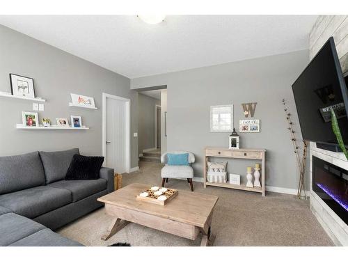 17 Riviera Bay, Cochrane, AB - Indoor Photo Showing Living Room