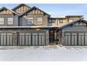 402-110 Coopers Common Sw, Airdrie, AB  - Outdoor With Facade 