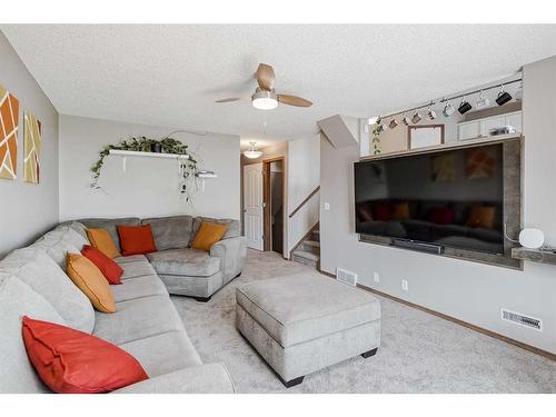 73 Applemont Place Se, Calgary, AB - Indoor Photo Showing Living Room