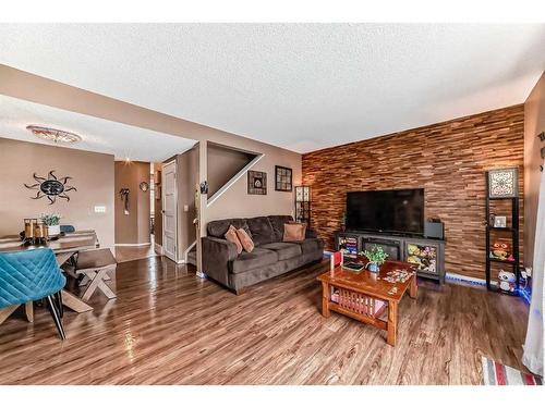 701-700 Allen Street Se, Airdrie, AB - Indoor Photo Showing Living Room