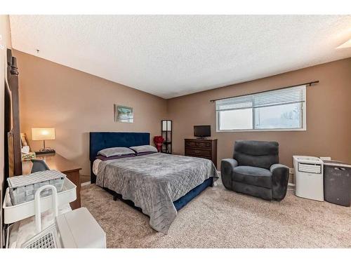 701-700 Allen Street Se, Airdrie, AB - Indoor Photo Showing Bedroom