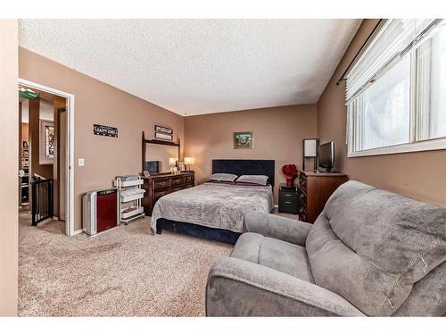 701-700 Allen Street Se, Airdrie, AB - Indoor Photo Showing Bedroom