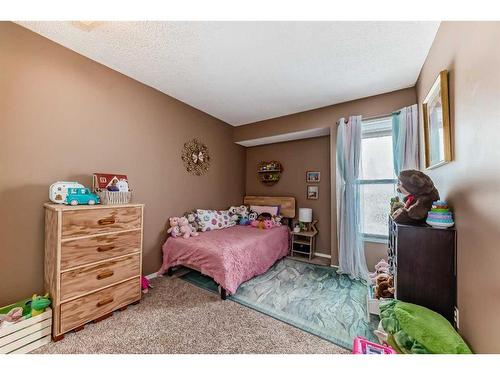 701-700 Allen Street Se, Airdrie, AB - Indoor Photo Showing Bedroom