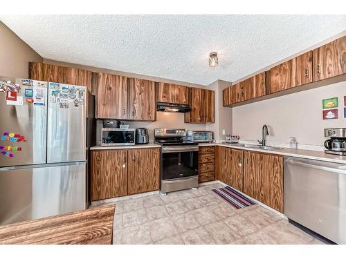 701-700 Allen Street Se, Airdrie, AB - Indoor Photo Showing Kitchen