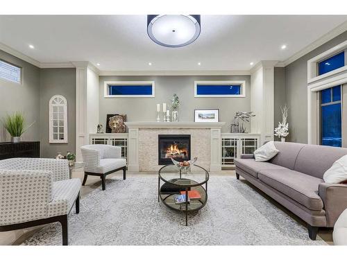 44 Bridle Estates Place Sw, Calgary, AB - Indoor With Fireplace