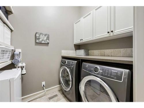 44 Bridle Estates Place Sw, Calgary, AB - Indoor Photo Showing Laundry Room