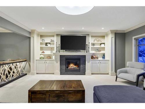 44 Bridle Estates Place Sw, Calgary, AB - Indoor Photo Showing Living Room With Fireplace