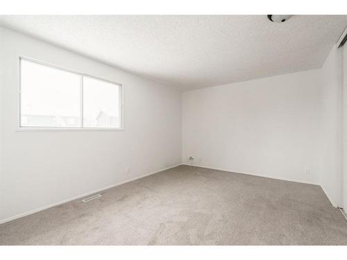 51 Falshire Place Ne, Calgary, AB - Indoor Photo Showing Other Room