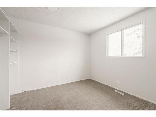 51 Falshire Place Ne, Calgary, AB - Indoor Photo Showing Other Room