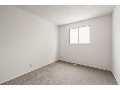 51 Falshire Place Ne, Calgary, AB - Indoor Photo Showing Other Room