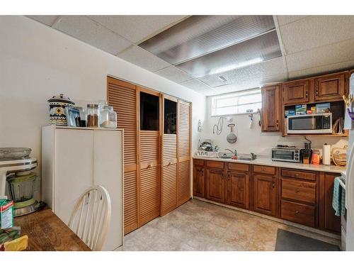 51 Falshire Place Ne, Calgary, AB - Indoor Photo Showing Kitchen With Double Sink