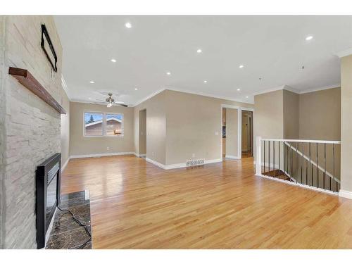 4704 Whitehorn Drive Ne, Calgary, AB - Indoor Photo Showing Other Room With Fireplace