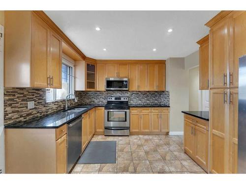 4704 Whitehorn Drive Ne, Calgary, AB - Indoor Photo Showing Kitchen With Stainless Steel Kitchen With Double Sink