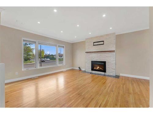 4704 Whitehorn Drive Ne, Calgary, AB - Indoor Photo Showing Living Room With Fireplace