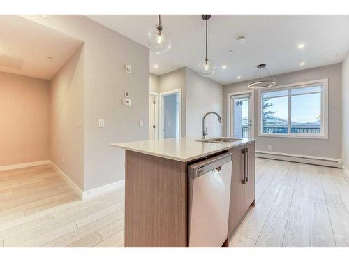 1109-111 Wolf Creek Drive, Calgary, AB - Indoor Photo Showing Kitchen With Upgraded Kitchen