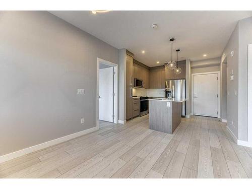 1109-111 Wolf Creek Drive, Calgary, AB - Indoor Photo Showing Kitchen