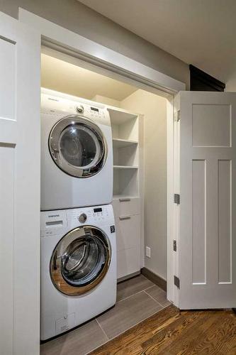 1023 Lake Bonavista Drive Se, Calgary, AB - Indoor Photo Showing Laundry Room