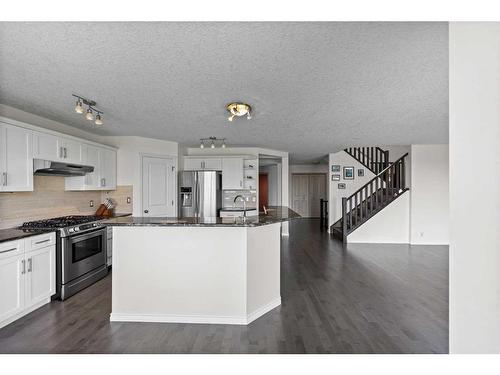 128 Tuscany Ravine Terrace Nw, Calgary, AB - Indoor Photo Showing Kitchen With Upgraded Kitchen