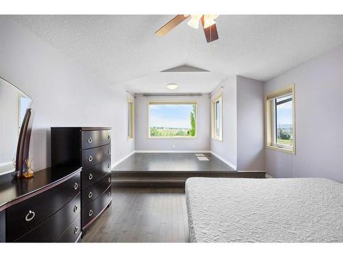 128 Tuscany Ravine Terrace Nw, Calgary, AB - Indoor Photo Showing Bedroom