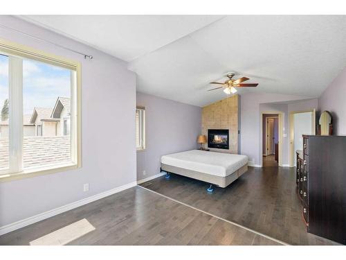 128 Tuscany Ravine Terrace Nw, Calgary, AB - Indoor With Fireplace