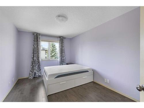 128 Tuscany Ravine Terrace Nw, Calgary, AB - Indoor Photo Showing Bedroom