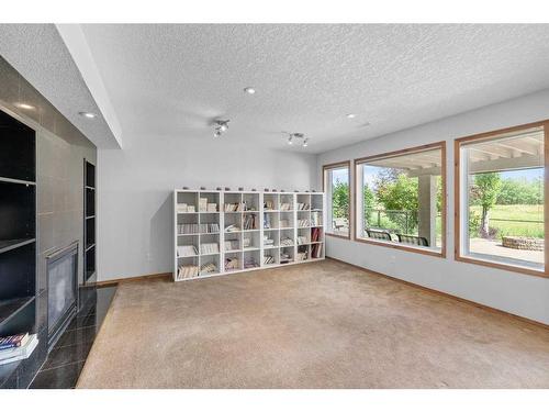 128 Tuscany Ravine Terrace Nw, Calgary, AB - Indoor With Fireplace