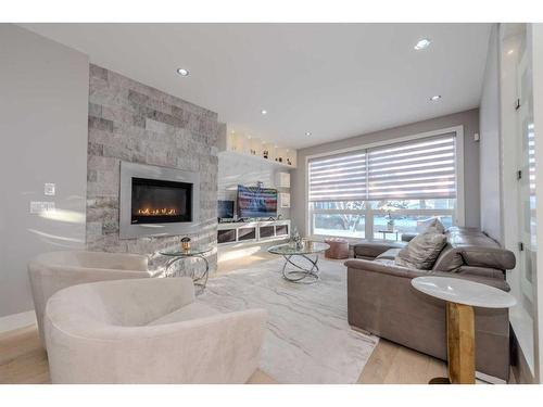 222 12 Avenue Ne, Calgary, AB - Indoor Photo Showing Living Room With Fireplace