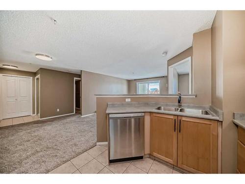 2216-2518 Fish Creek Boulevard Sw, Calgary, AB - Indoor Photo Showing Kitchen With Double Sink