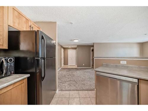 2216-2518 Fish Creek Boulevard Sw, Calgary, AB - Indoor Photo Showing Kitchen