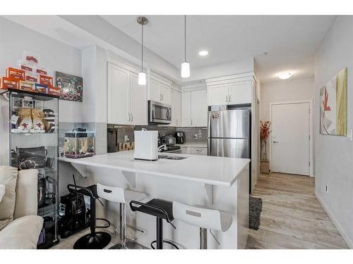 122-20 Seton Park Se, Calgary, AB - Indoor Photo Showing Kitchen With Stainless Steel Kitchen