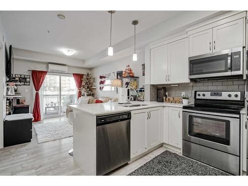 122-20 Seton Park Se, Calgary, AB - Indoor Photo Showing Kitchen With Stainless Steel Kitchen