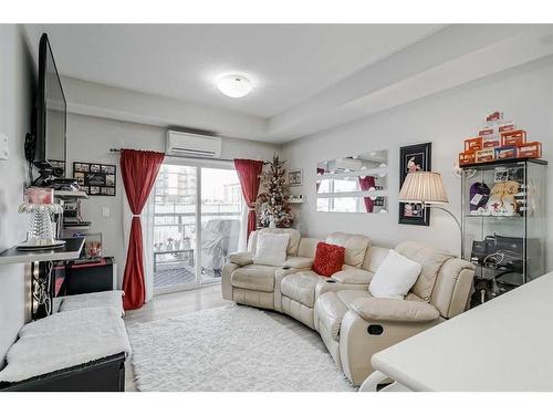 122-20 Seton Park Se, Calgary, AB - Indoor Photo Showing Living Room