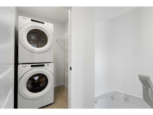 59 Edith Terrace Nw, Calgary, AB - Indoor Photo Showing Laundry Room