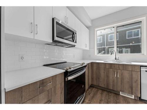 305-137 Red Embers Link Ne, Calgary, AB - Indoor Photo Showing Kitchen With Upgraded Kitchen