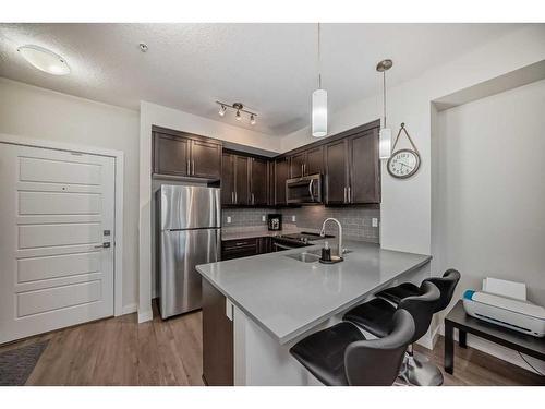 103-300 Auburn Meadows Manor Se, Calgary, AB - Indoor Photo Showing Kitchen With Stainless Steel Kitchen With Upgraded Kitchen