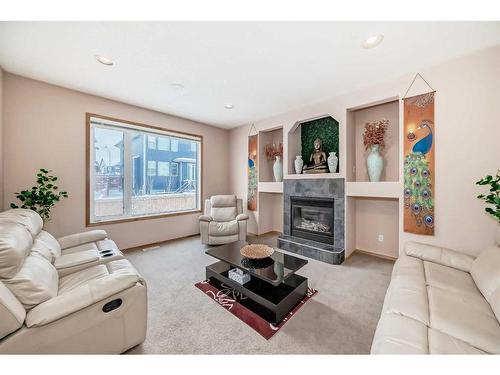 261 Tuscany Ridge Heights Nw, Calgary, AB - Indoor Photo Showing Living Room With Fireplace