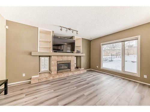 192 Citadel Green Nw, Calgary, AB - Indoor With Fireplace