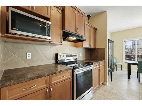 224 Silverado Range Heights Sw, Calgary, AB - Indoor Photo Showing Kitchen