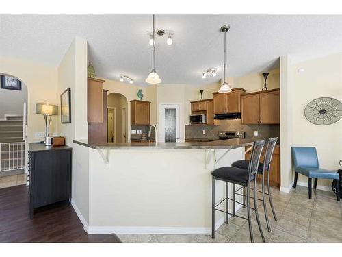 224 Silverado Range Heights Sw, Calgary, AB - Indoor Photo Showing Kitchen With Upgraded Kitchen