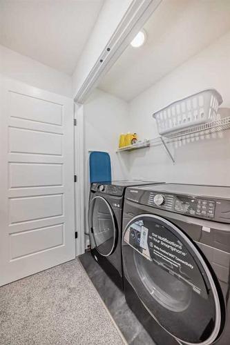 240 Belmont Boulevard Sw, Calgary, AB - Indoor Photo Showing Laundry Room