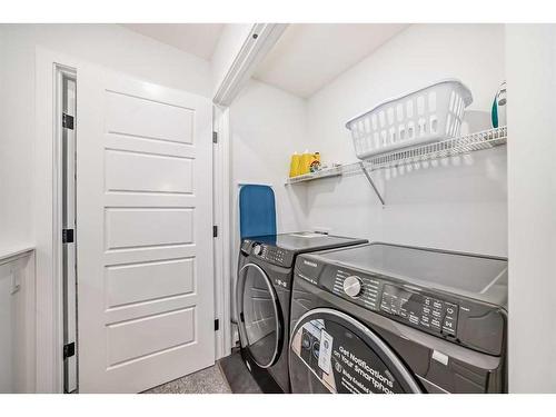 240 Belmont Boulevard Sw, Calgary, AB - Indoor Photo Showing Laundry Room