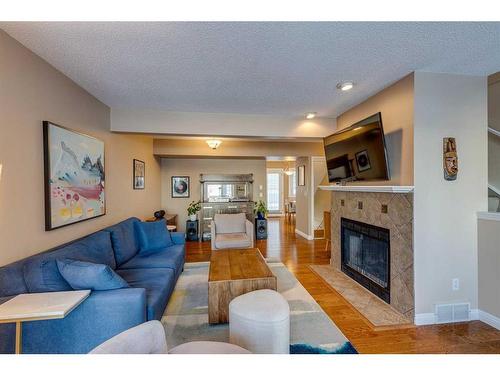 1-533 14 Avenue Sw, Calgary, AB - Indoor Photo Showing Living Room With Fireplace