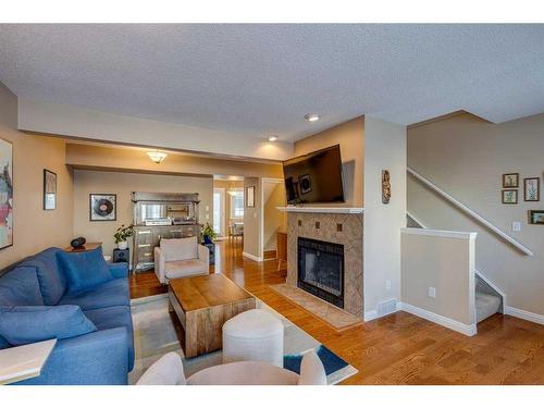 1-533 14 Avenue Sw, Calgary, AB - Indoor Photo Showing Living Room With Fireplace